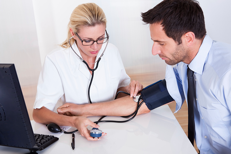 nurse-checks-blood-pressure